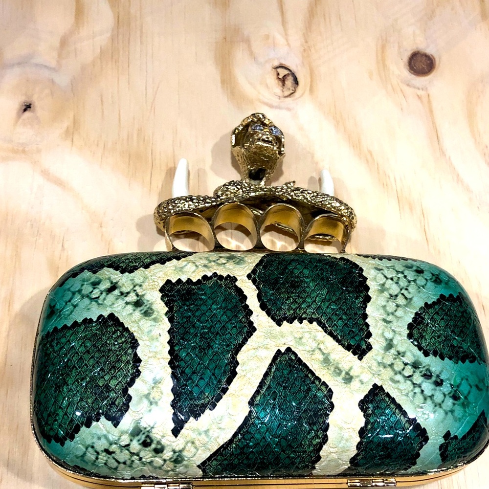 Green and Gold hardware,Snake Clutch knuckles unicorn rings and snake pattern.